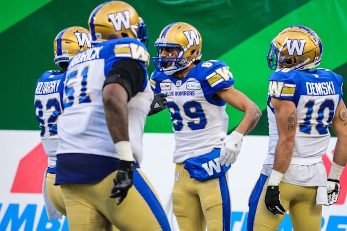 Nov 17, 2019; Regina, Saskatchewan, CAN; Saskatchewan Roughriders wide receiver Brayden Lenius (89) celebrates touchdown with teammates against the Saskatchewan Roughriders in the first half during the CFL Western Conference Final football game at Mosaic Stadium. Mandatory Credit: Sergei Belski-USA TODAY Sports